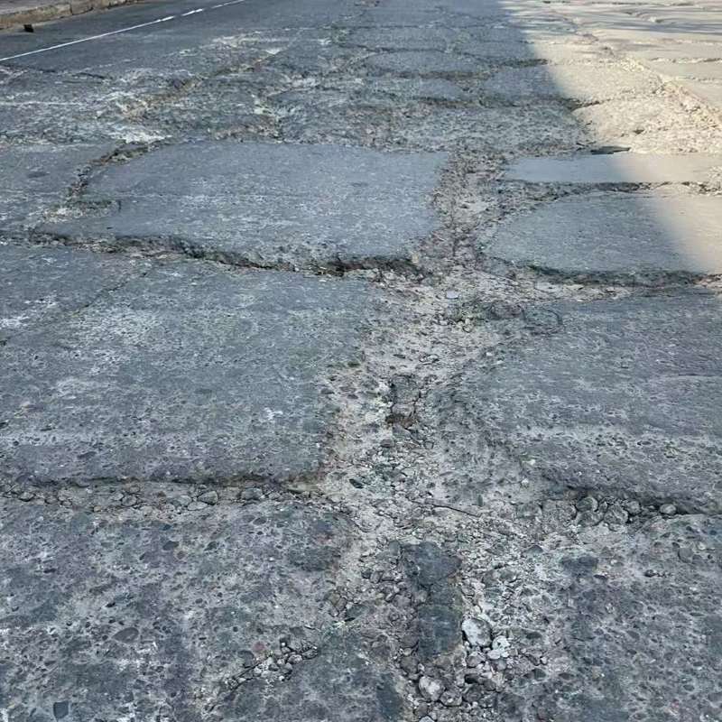 北川路面起砂露石子修补料